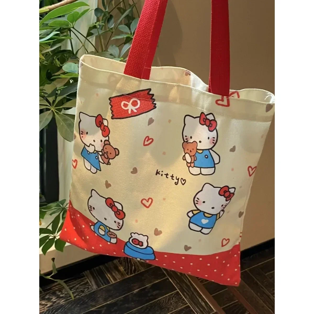 Nuevo bolso de mano de Hello Kitty MINISO, bolso de lona de gran capacidad, bolso de hombro portátil de almacenamiento informal de viaje