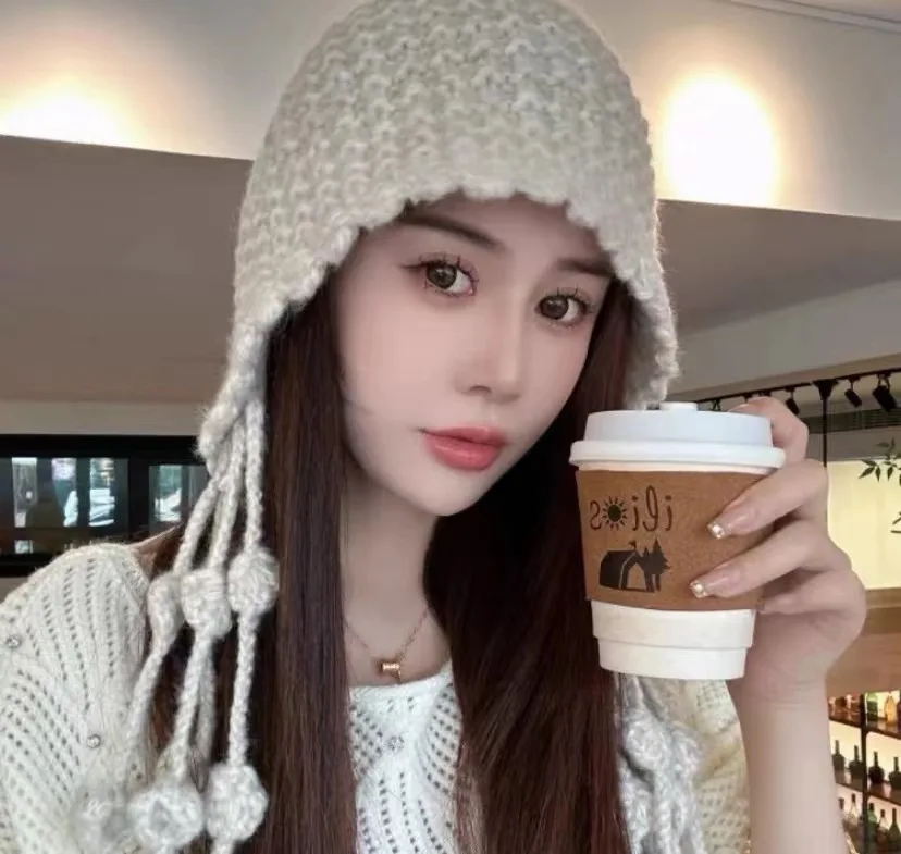 Fashion handwoven tassel ball wool hat warm ear strap knit hat