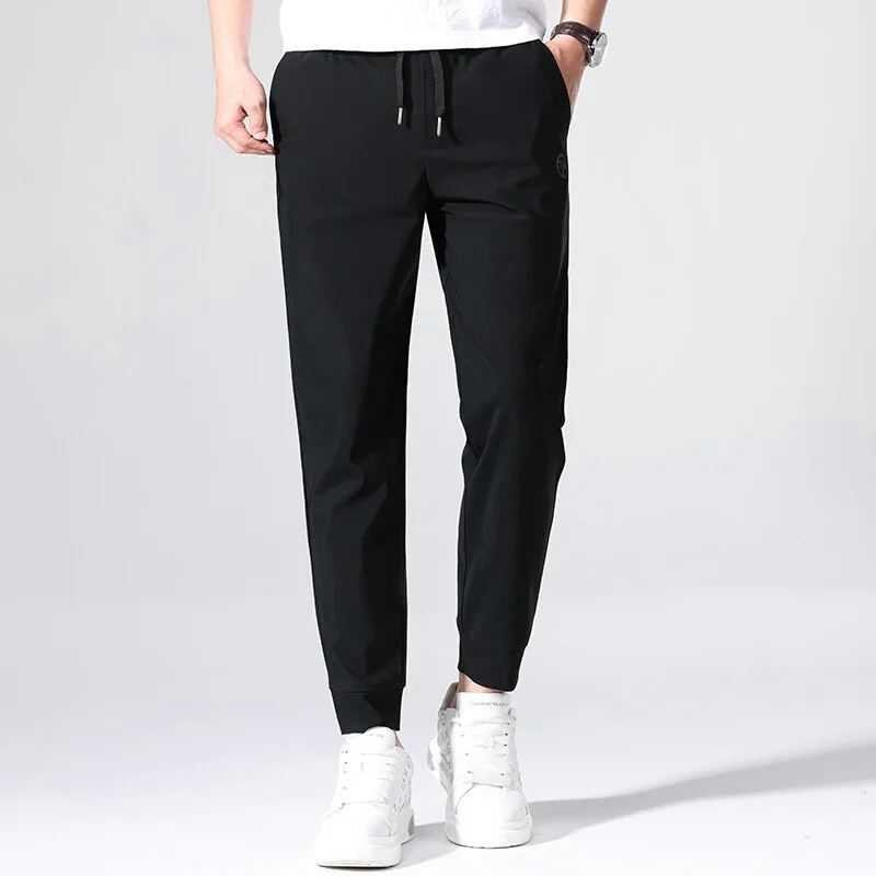 

2025 Summer Ice Silk Thin Sweat Pants Men Classic Solid Color Loose Casual Trousers Sports Quick Drying Breathable Jogging Pants