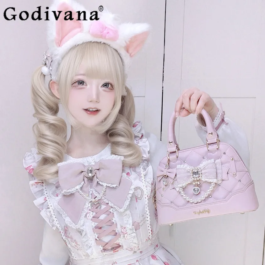 

Original Lolita Sweet Girls Princess Pink Handbag Subculture Japanese Mass-produced Cute Bow Pearl Chain Crossbody Bag Women