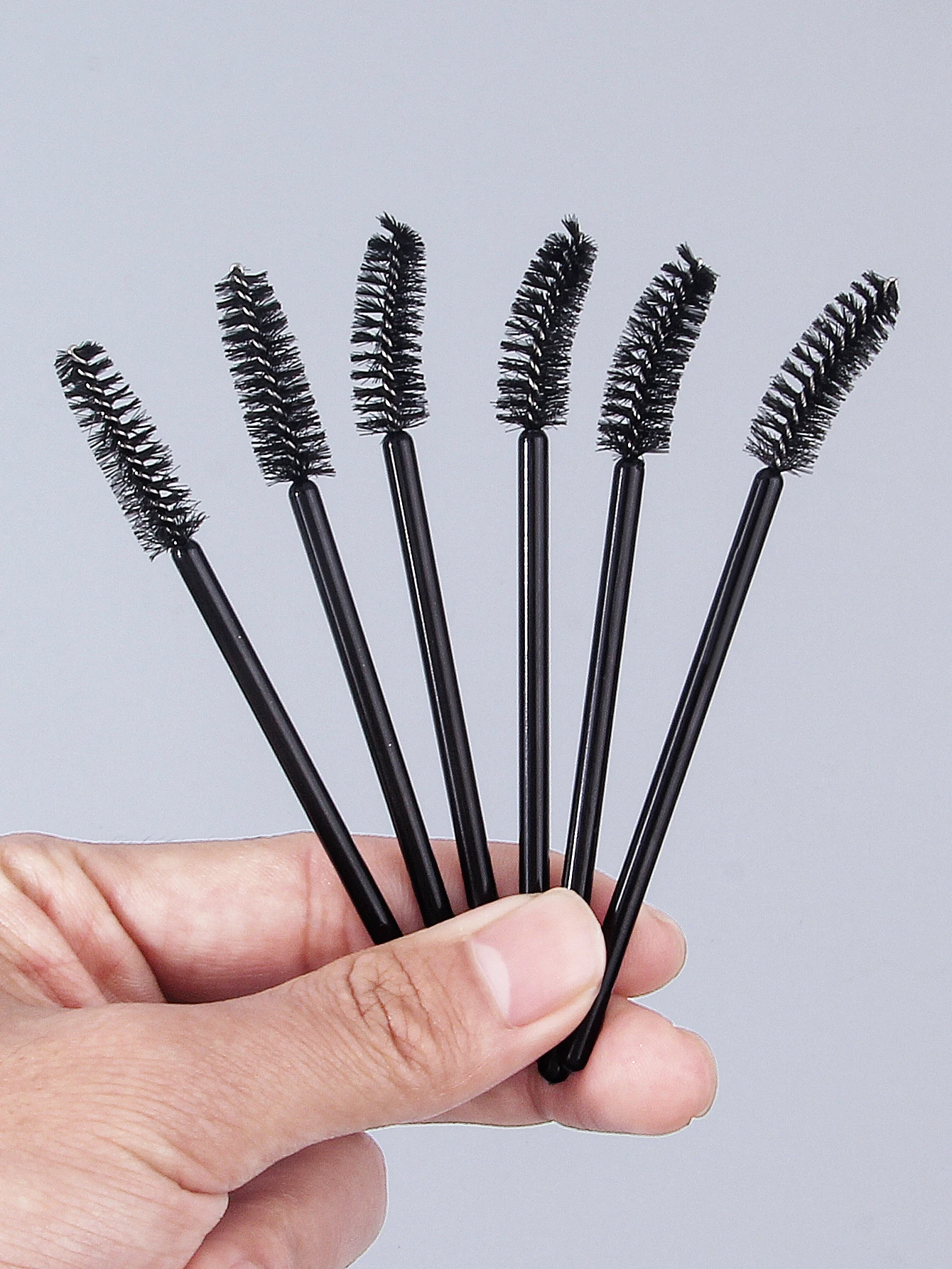 Juego de 50 peines para pestañas y brochas para cejas, conveniente para aplicar rímel y extender pestañas, herramienta de maquillaje portátil