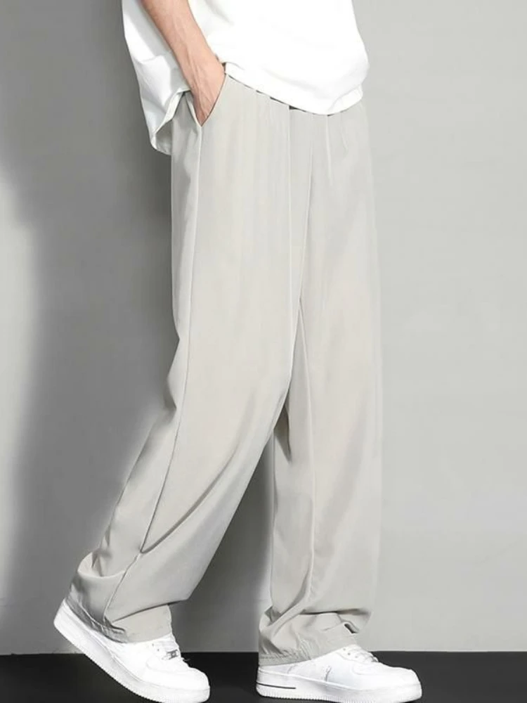 GELITAYIN ฤดูร้อนผ้าไหมน้ำแข็งสีทึบสบายๆกางเกงขากว้างผู้ชายคลาสสิกหลวมสตรีทแวร์สไตล์เกาหลี Xxxl ขายกางเกงดีไซเนอร์