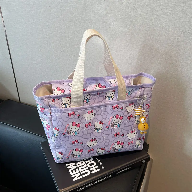 Kawaii HelloKitty سعة كبيرة حقيبة محمولة باليد المرأة متعددة الاستخدامات للطلاب الخروج حقيبة الأم لعمال المكاتب حقيبة التنقل