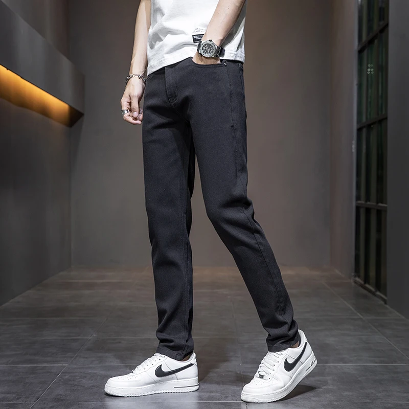 New four season jeans men's casual small straight leg long pantsNew four season jeans men's casual small straight leg long pants