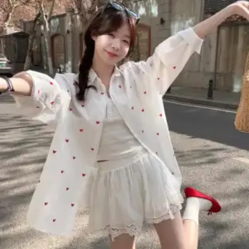 เสื้อเชิ้ตลายทางสีฟ้า เสื้อเชิ้ตแขนยาวพิมพ์ลายโบว์สไตล์เกาหลีลำลองสำหรับผู้หญิง