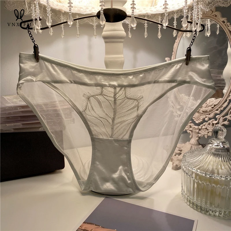 2023 new French sexy low waist light translucent gauze triangle pants women\'s quick-dry hot satin stitching lace underwear