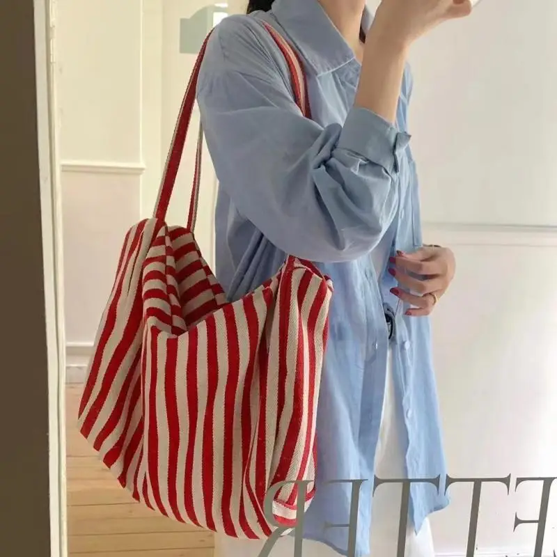 

Korean women's chic casual versatile striped canvas bag practical tote bag under the armpit shoulder bag large capacity