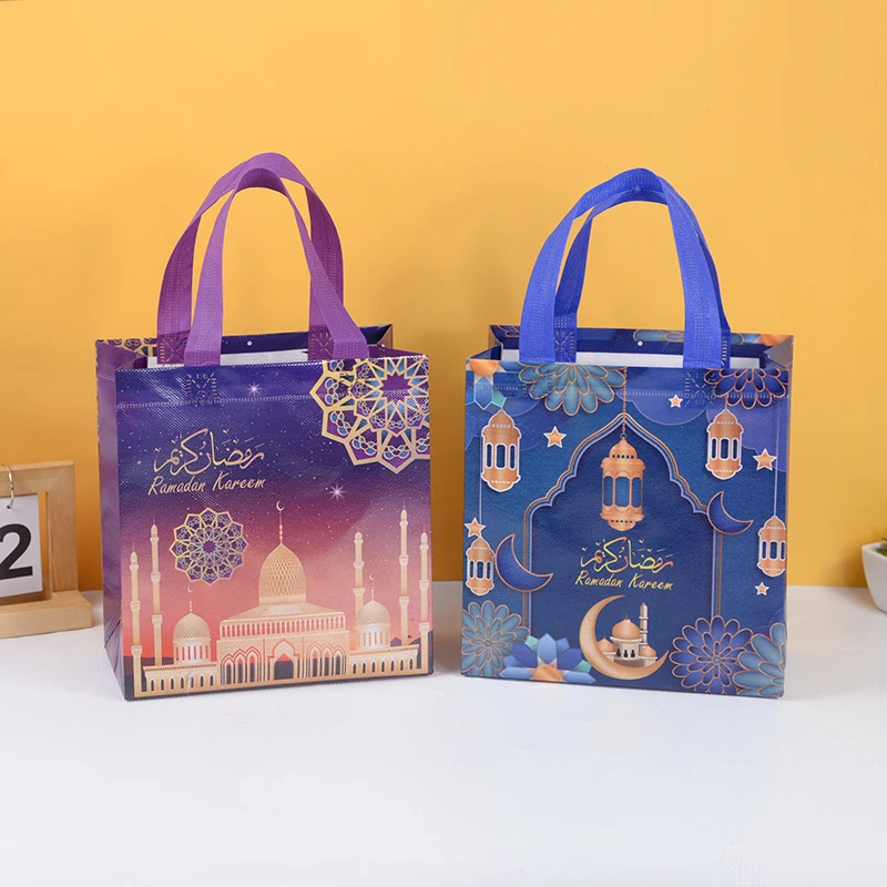 

4pcs Eid Mubarak Gift Bag Ramadan Kareem Nonwoven Pouch Cookie Candy Packaging Bags 2025 Islamic Muslim Party Eid Gifts Bags
