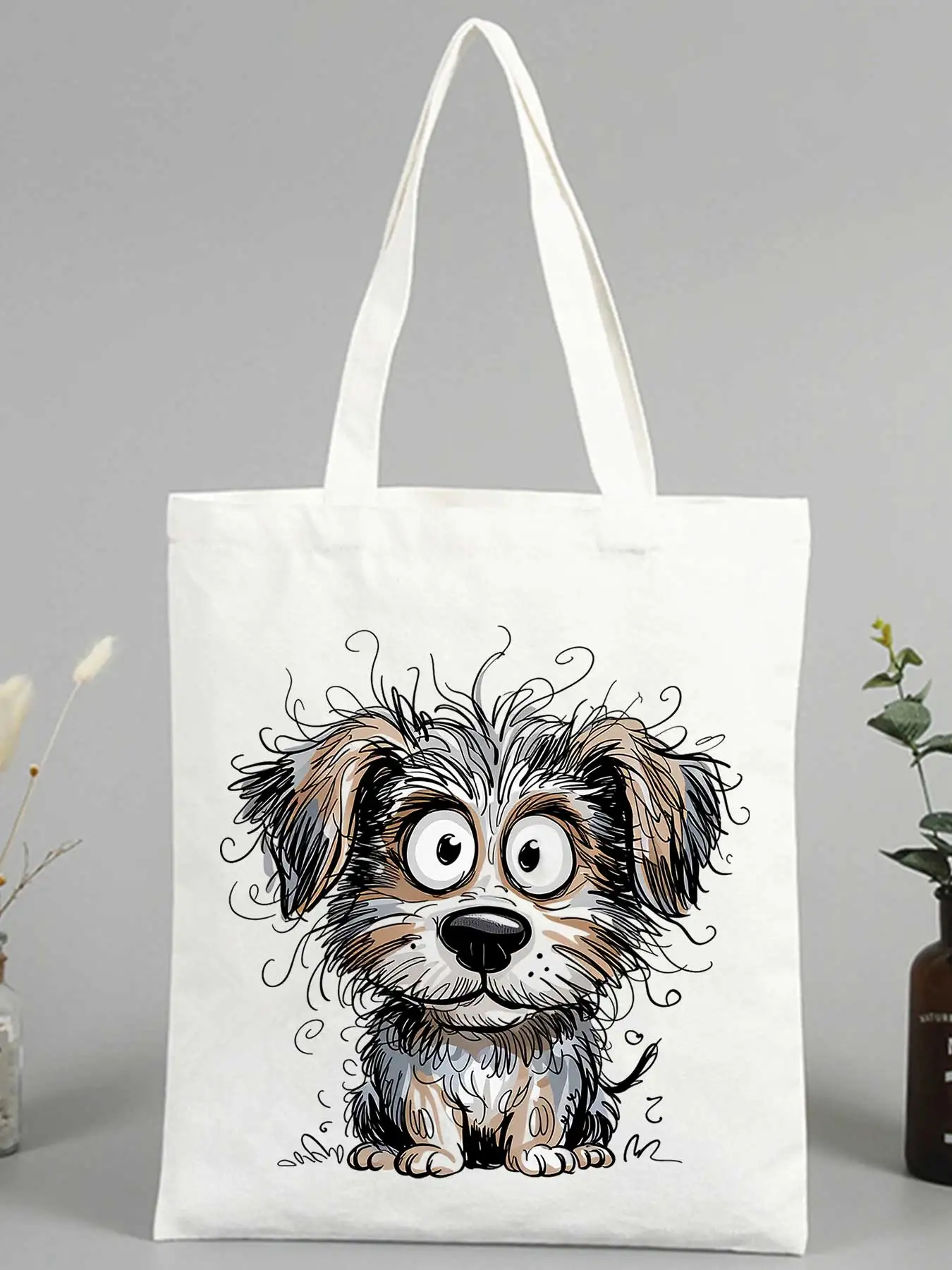 Women's canvas tote bag with cute puppy graphic, casual style for daily shopping and outings