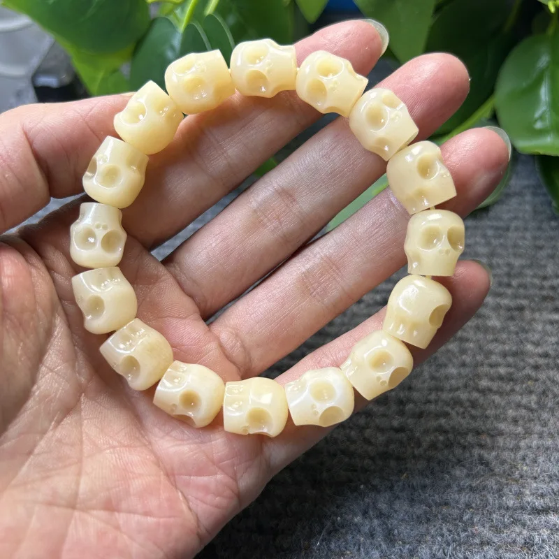 Natural uncolored camel carved skull bracelet, chicken fat yellow bone beads, long string 12mm
