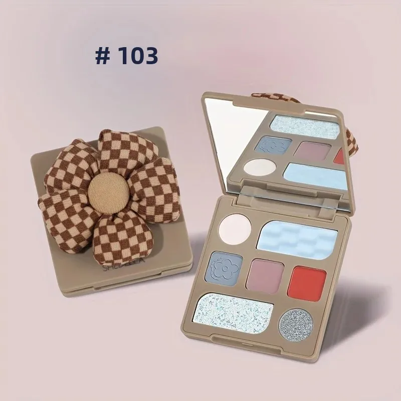 マット、パール、シマー、グリッター仕上げ、ニュートラルなアーストーンを備えた7色のフラワーアイシャドウパレット1箱。