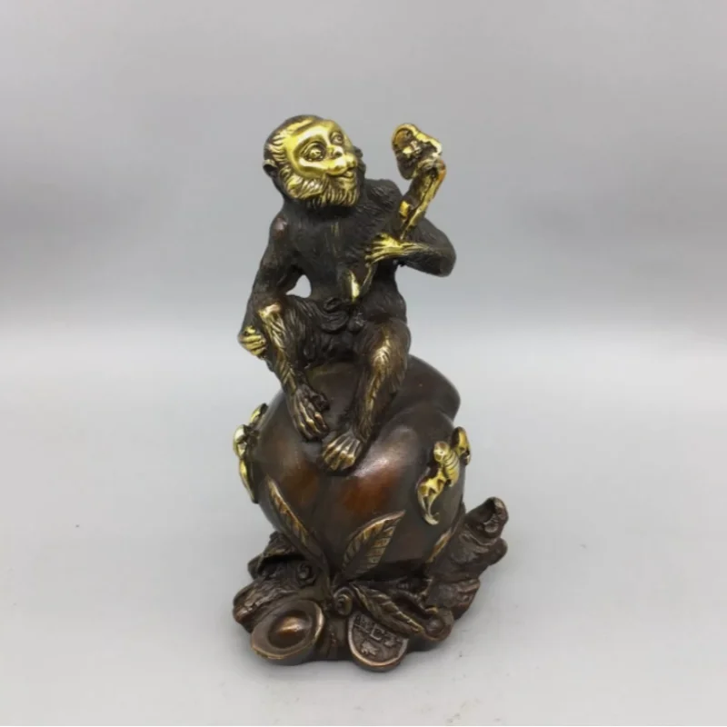 

Copper gilded peach on the monkey, with the seal of a feudal lord hanging on it