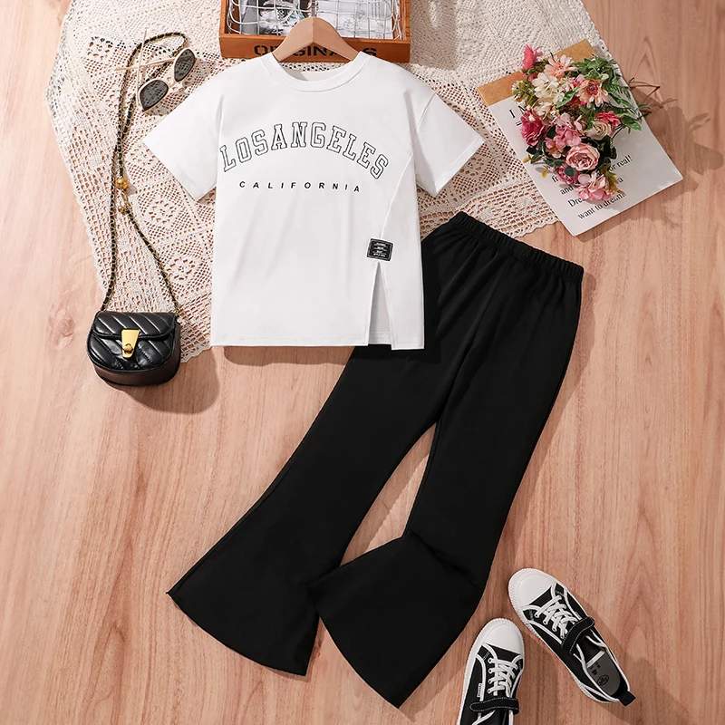 Koreanisches Outfit, weiße Buchstaben, bedruckt, langes T-Shirt und schwarze Schlaghose, 2-teilig, Sommer, tägliches Freizeit-Outfit, Kinder-Sets, Mädchen OOTD