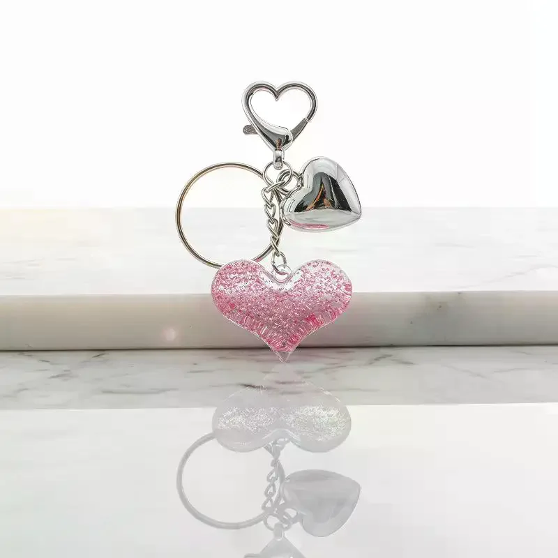 Porte-clés sculpté en forme de cœur pour sacs et voitures tendance