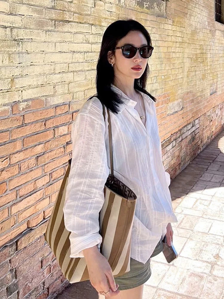 เสื้อคลุมหลวมทรงยาวผ้าฝ้ายลินินป้องกันแสงแดดสำหรับผู้หญิง ฤดูร้อน ผ้าบาง สไตล์ลำลอง สีขาว คอปก ความยาวปานกลาง...