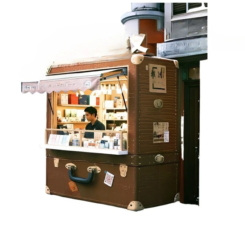 giant simulated suitcase convenience booth, trolley case shaped food, mobile dining car
