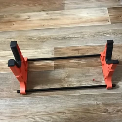 Universal gun stand for rifle cleaning and maintenance, featuring molded saddle, precision cleaning rod slots