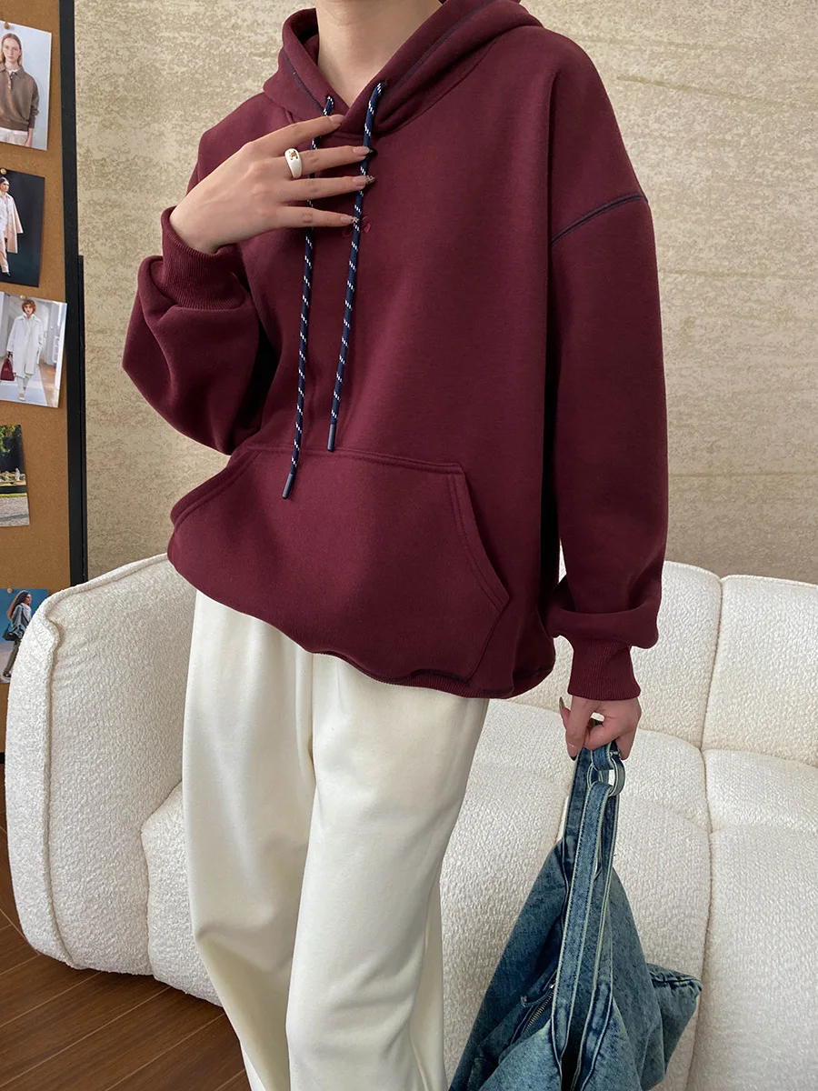 Autumn and winter women's casual solid color embroidered design loose hooded sweatshirt