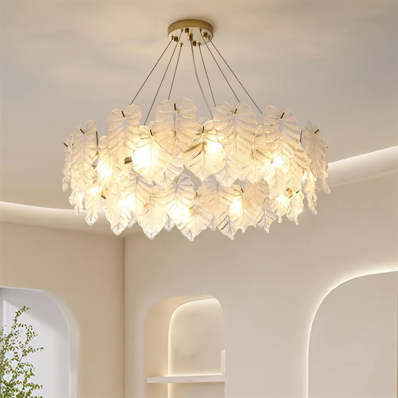 

The chandelier in the living room is French light luxury leaves and the master bedroom is modern and simple chandelier