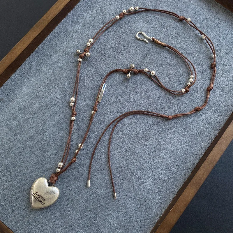 

2025 Fashion Classic European and American Luxury Beads Good Luck Love Sweater Chain Fashion Banquet Gift