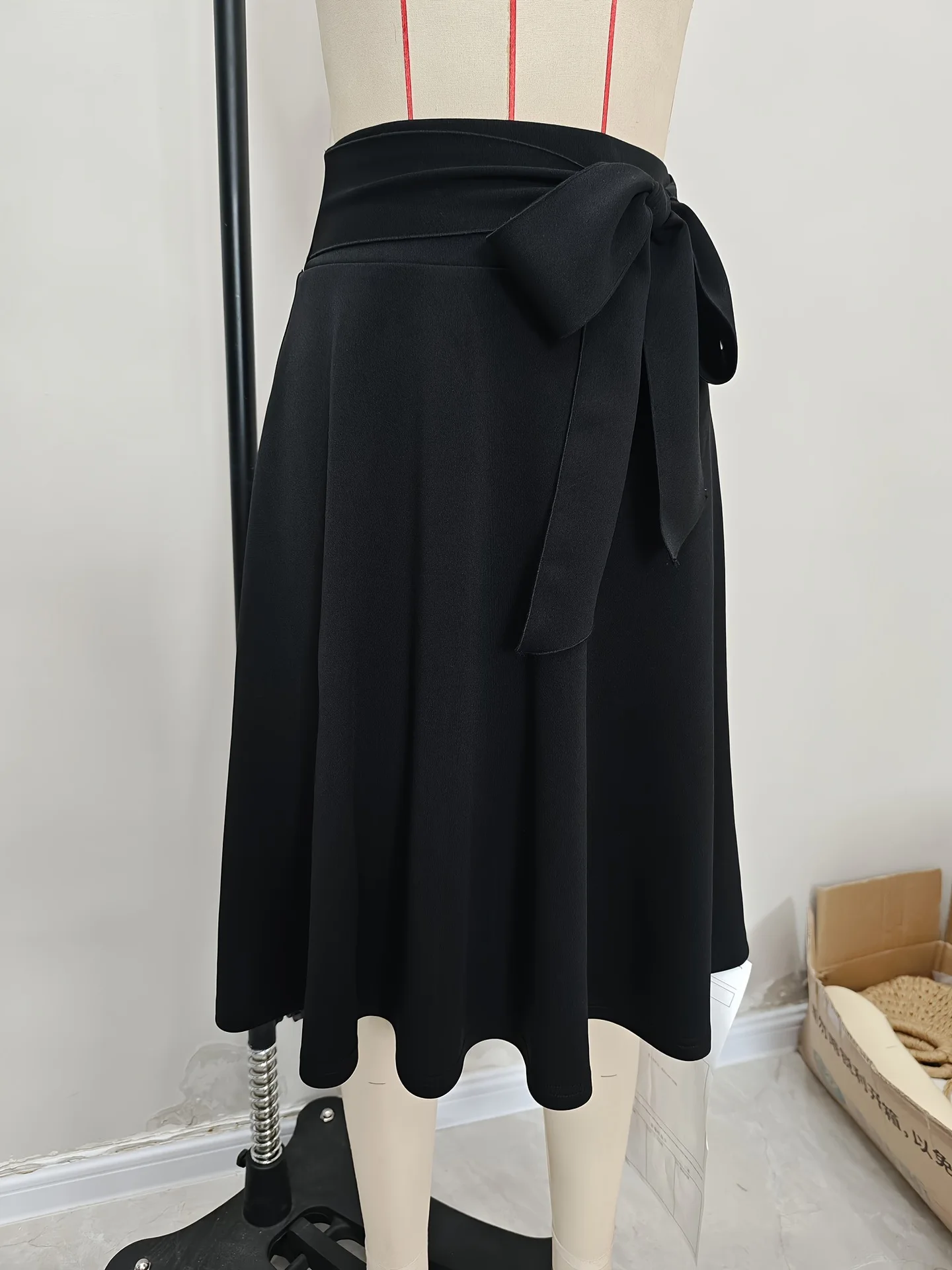 Skirts women 2026 A-line elastic knitted high-waisted strappy mid-length retro umbrella skirt women's clothing