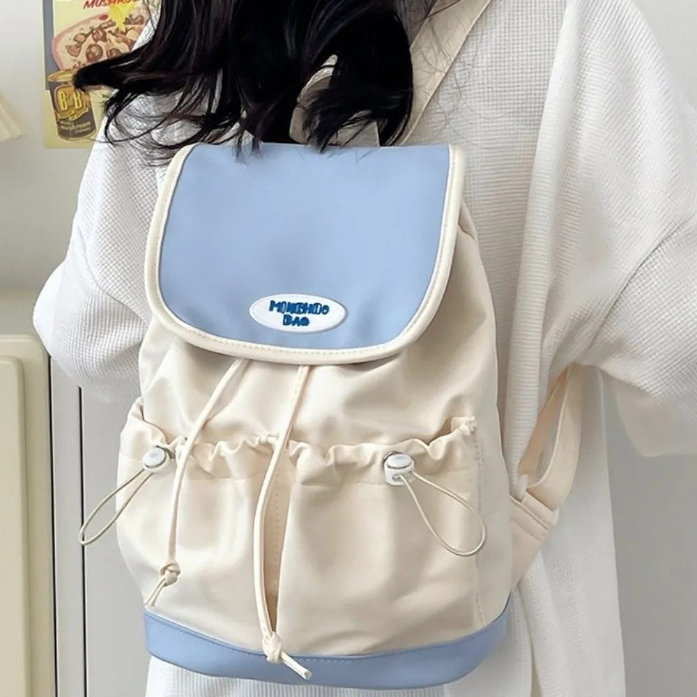حقيبة ظهر بسيطة برباط من النايلون بسعة كبيرة على الطراز الكوري حقيبة كتف متعددة الجيوب حقيبة مدرسية ملونة للطلاب هدية