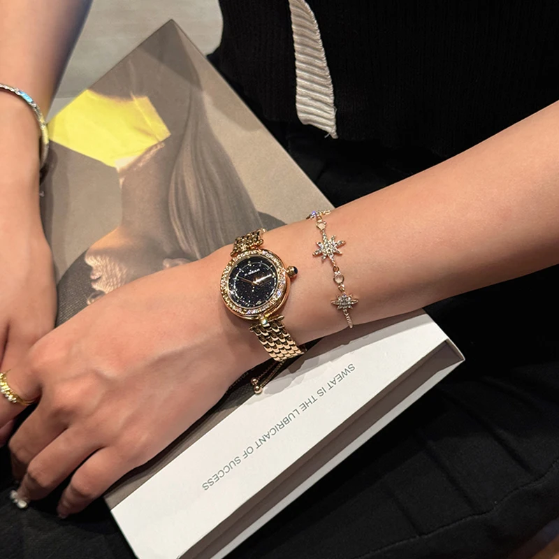 ساعة كوارتز نسائية أنيقة بمينا مرصعة بالنجوم من X-GEAR - ساعة عصرية بسوار من الفولاذ المقاوم للصدأ هدية للمهرجانات