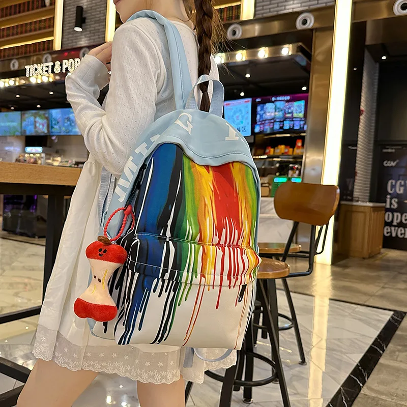 High aesthetic rainbow graffiti backpack for middle and high school students lightweight and large capacity backpack for leisure