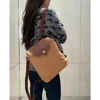 Mochila francesa conmemorativa del 70 aniversario, de nailon bordado, impermeable, unisex, de gran capacidad, estilo urbano minimalista, bolso de lujo para mujer y niña