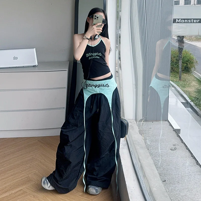 กางเกงพาราชูทผู้หญิง สไตล์อเมริกัน ผ้ากำมะหยี่ทรงหลวม สำหรับเต้นรำ กิจกรรมกลางแจ้ง สไตล์กรันจ์ แฟชั่นฮาโลวีน ลายปะติด