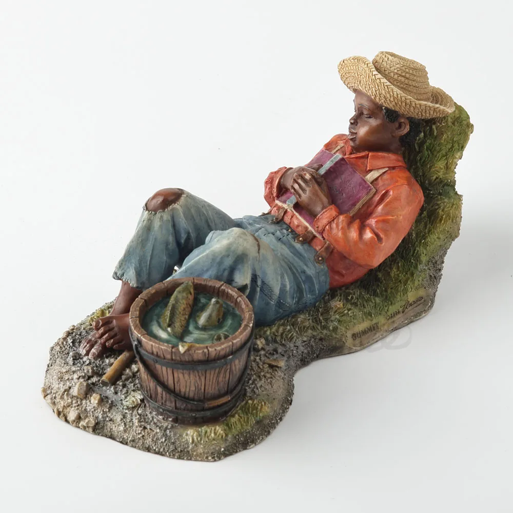 African American Little Boy Resting on Riverside Reading Book Statue Young Black Boy Resin Figurine Home Desktop Decorative Gift