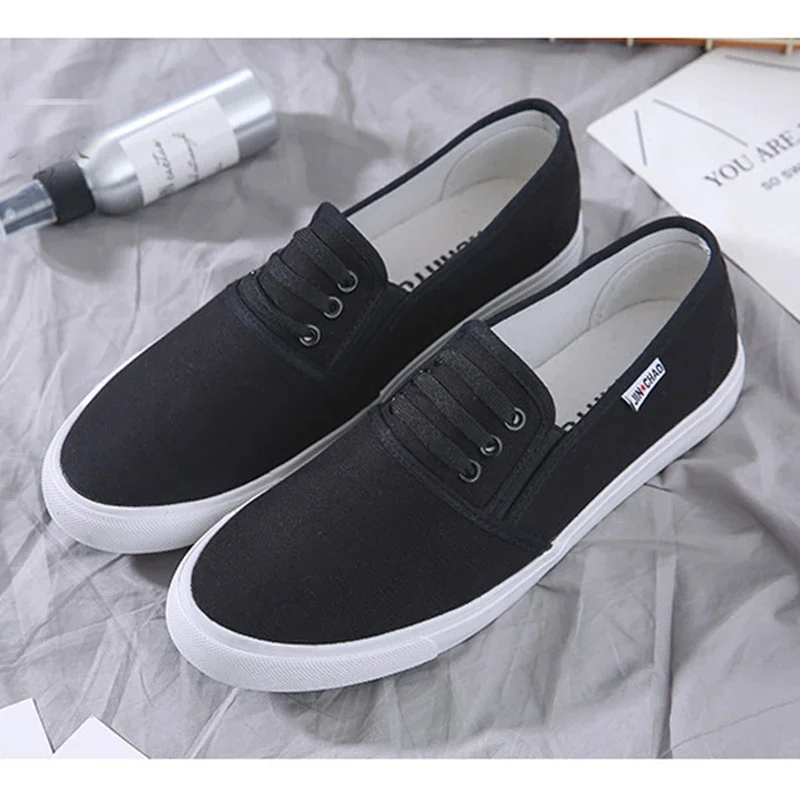 

Весенне-осенняя мягкая дышащая мужская тканевая обувь без шнуровки, чистая черная мужская брендовая парусиновая обувь на плоской подошве, нескользящая DX557