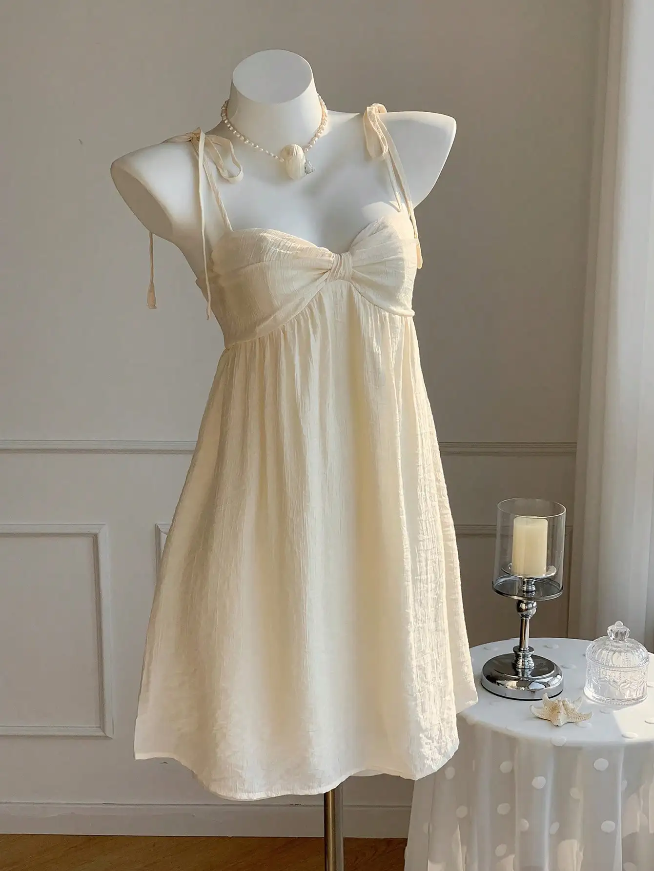 

Cream Solid Spaghetti Strap Bow Front Dress for Spring Summer