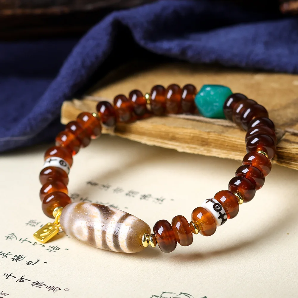 

2026 on new Tibetan decorations imitation mountain turtle bracelet cultural toys two-eyed dzi ethnic agate strings