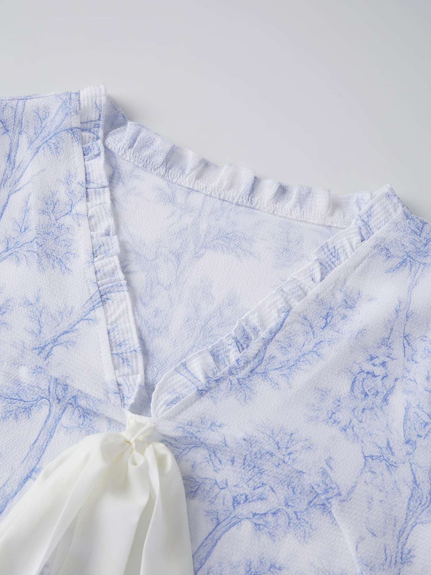 طقم بيجامة نسائي مكون من قطعتين بأكمام طويلة وقمصان علوية وسروال قصير من الأمام