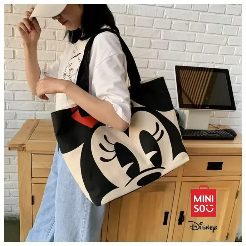 

MINISO Disney New Large Capacity Tote Bag - Versatile Cartoon Canvas Backpack for Students & Professionals Valentine's Day Gift