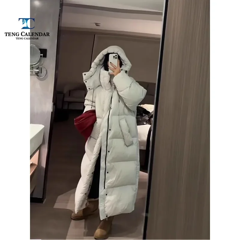 Chaqueta de plumón de moda, chaqueta de plumón de pato blanco coreano hasta la rodilla con capucha gruesa de medio a largo, nuevo estilo de invierno 2024 para mujer