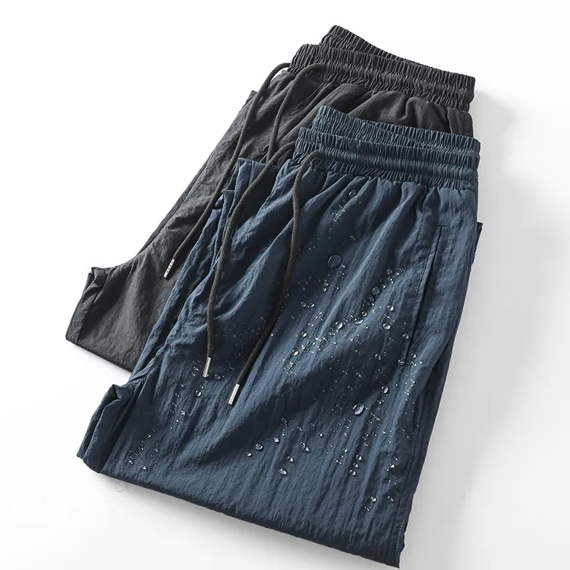 

Легкие водонепроницаемые мужские повседневные брюки из плиссированной нейлоновой ткани, летние, новые, с низкой посадкой, прямые штанины, эластичный пояс