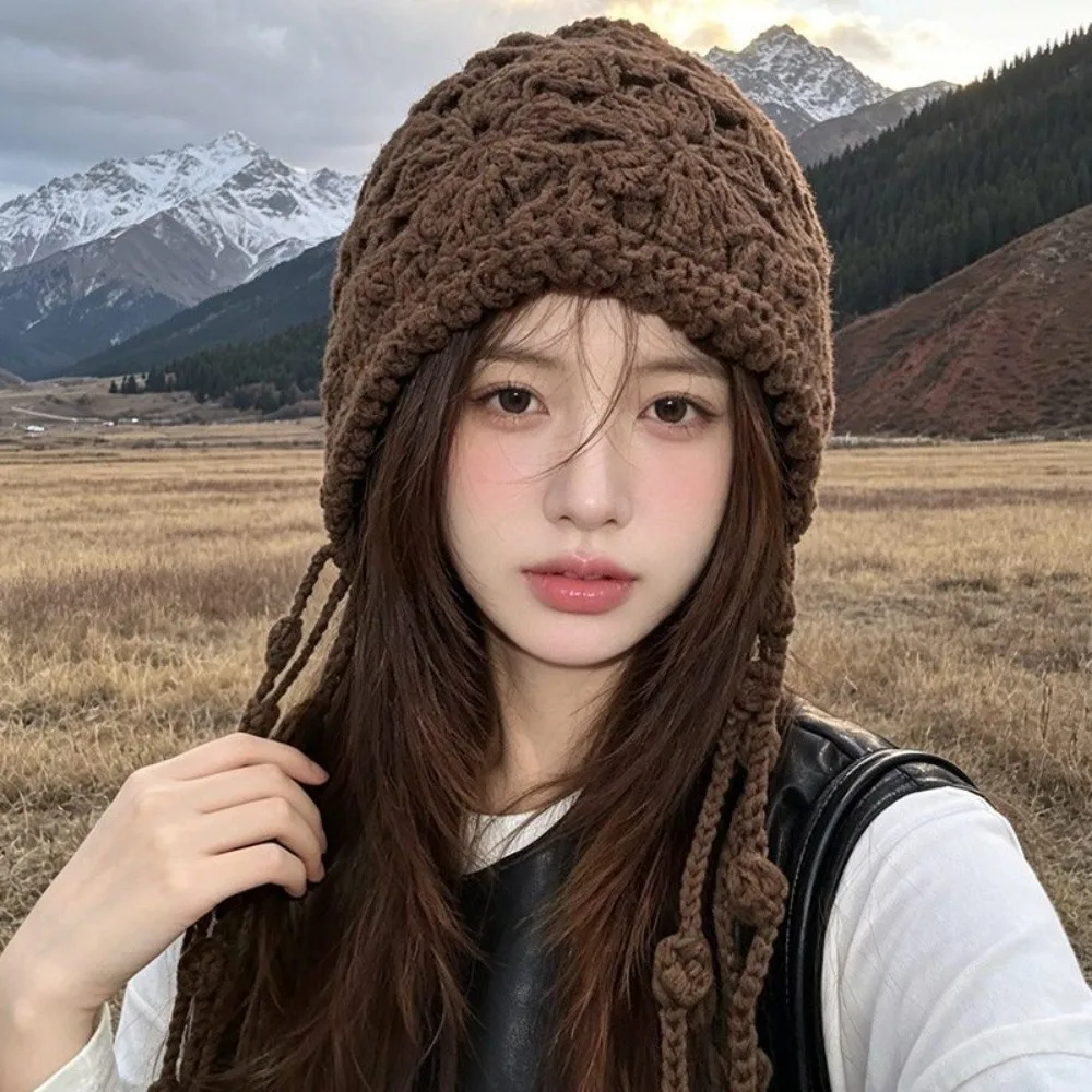 New Flower Knitted Crochet Hat with Tassels Ear Protector Mesh Pullover Hat Hollowed Out Braided Ear Flap Beanie Women