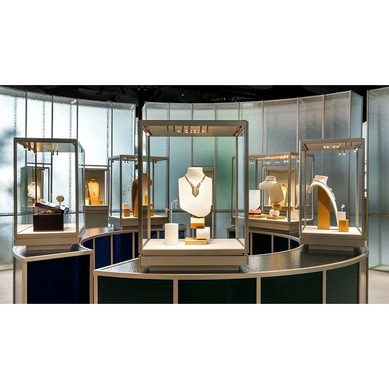 custom.Luxury Large Curved Jewelry Display Island Counter Gold Stainless Steel Mall Jewelry Showcase with Glass Top Boutique