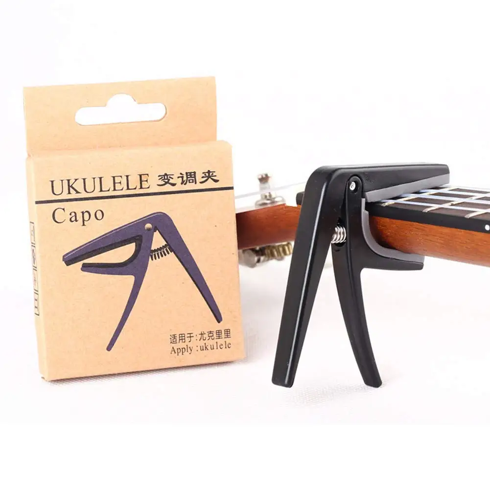 

Professional Ukulele Capo Single-handed Quick Change Ukelele Capo Hawaii Guitar Capos Guitar Parts & Accessories Drop shipping