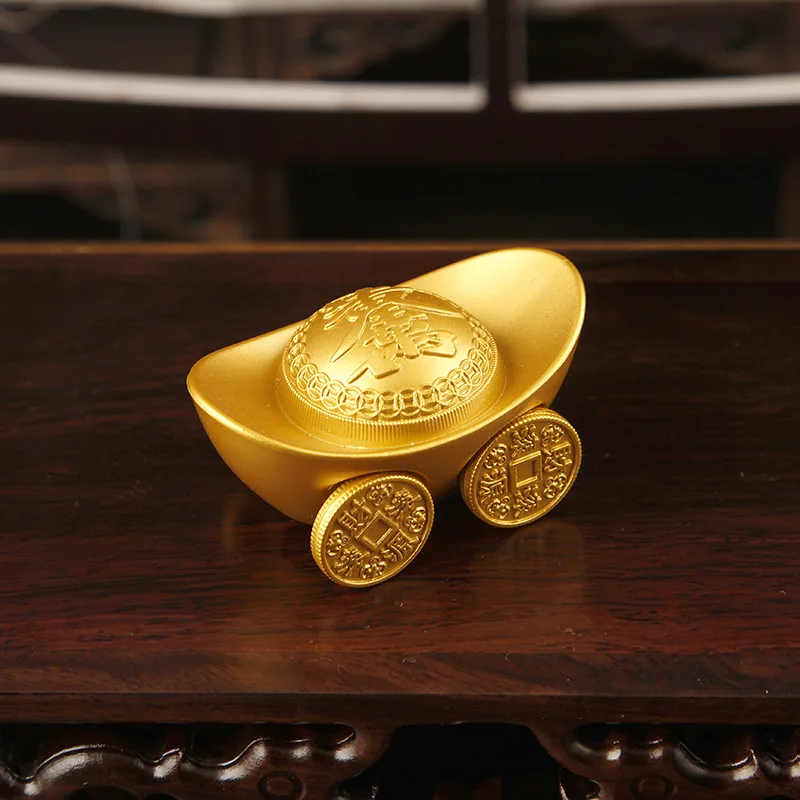 Feng Shui Brings In A 'Flood of wealth attracting wealth with a gold ingot car ornament, a craftwork of gold ingots for cars