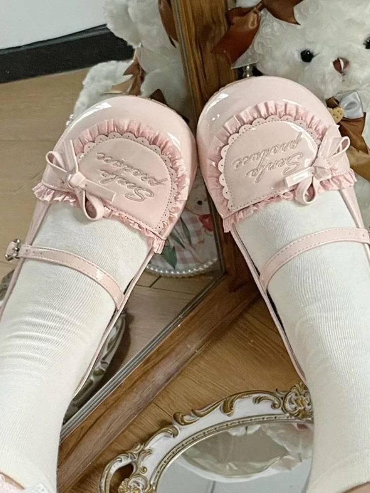 Oryginalne płaskie buty Kawaii Sweet Style Women New Japanese Cute Round Head Shoes Female Bow Letters Design Lolita Single Shoes