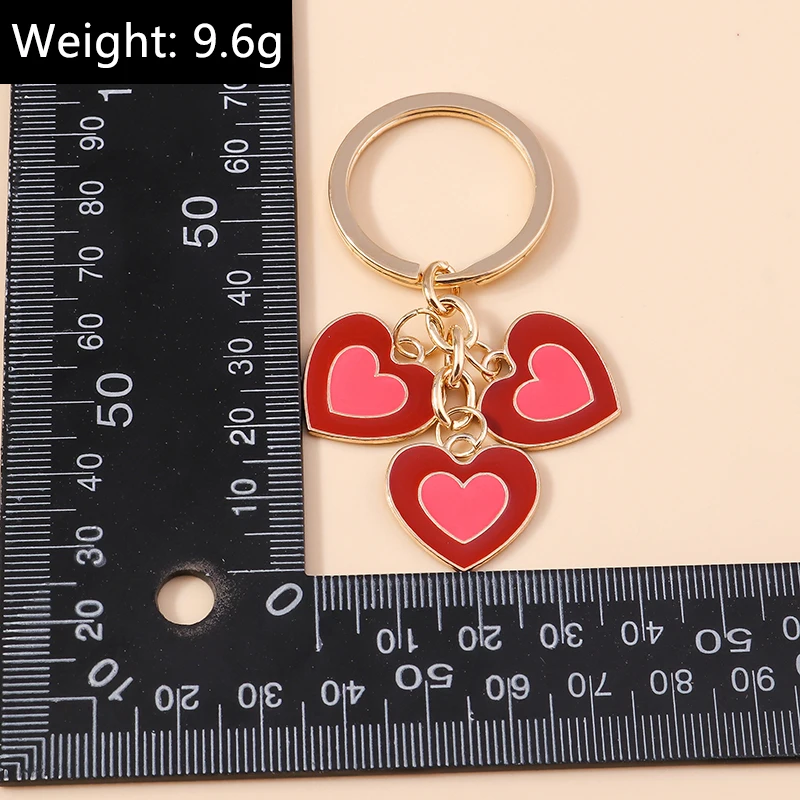 Niedlicher Schlüsselanhänger in Herzform, ein ideales Geschenk für Frauen und Männer, als Souvenir, für Autoschlüssel oder Handtaschen, zum Selbergestalten von Schmuck und als Accessoire. – Detail 17