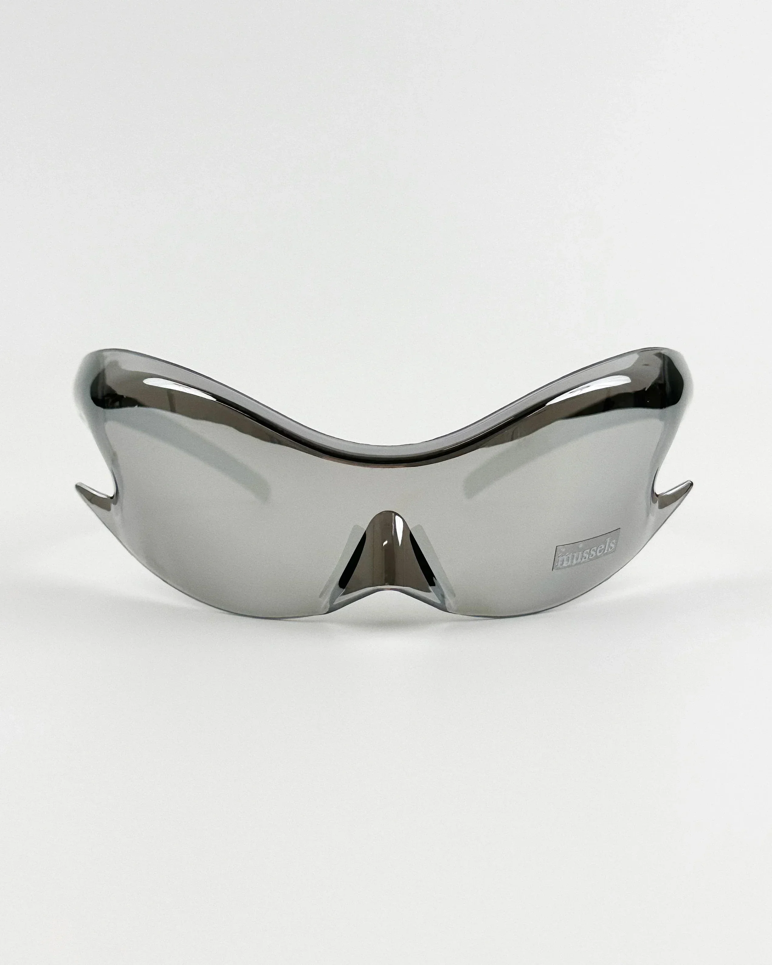 Avant-garde, fashionable, retro, and shapely connected sunglasses with a futuristic style and a wasteland era design. Sunglasses