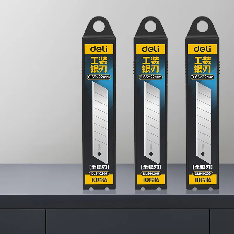 DELI mesjes voor universele messen, 22 mm, 0,65 mm, gelegeerd staal, 60 °   Vervangende messen voor snijmachines, universeel geschikt voor de meeste standaard messen, verpakking met 10 stuks.