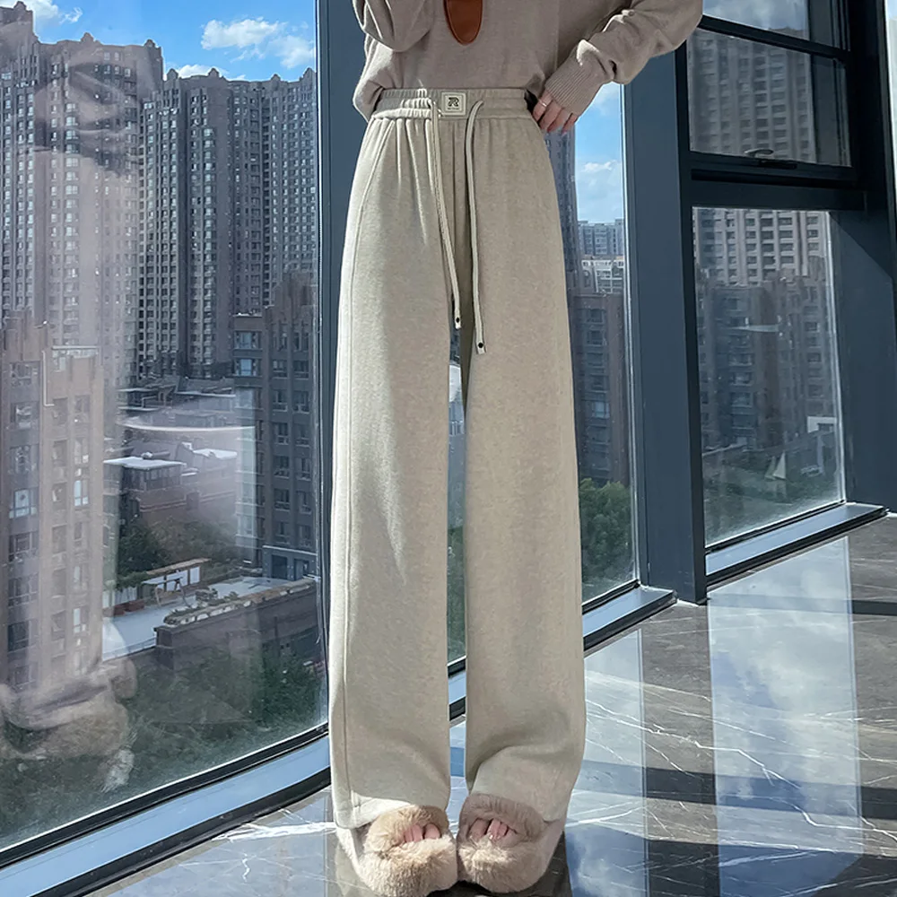 กางเกงขายาวทรงตรงสีแอปริคอทสำหรับผู้หญิง ฤดูใบไม้ร่วงและฤดูหนาว แฟชั่นระดับไฮเอนด์ใหม่ ไซส์พลัส เอวยางยืด สไตล์ลำลอง ขากว้าง