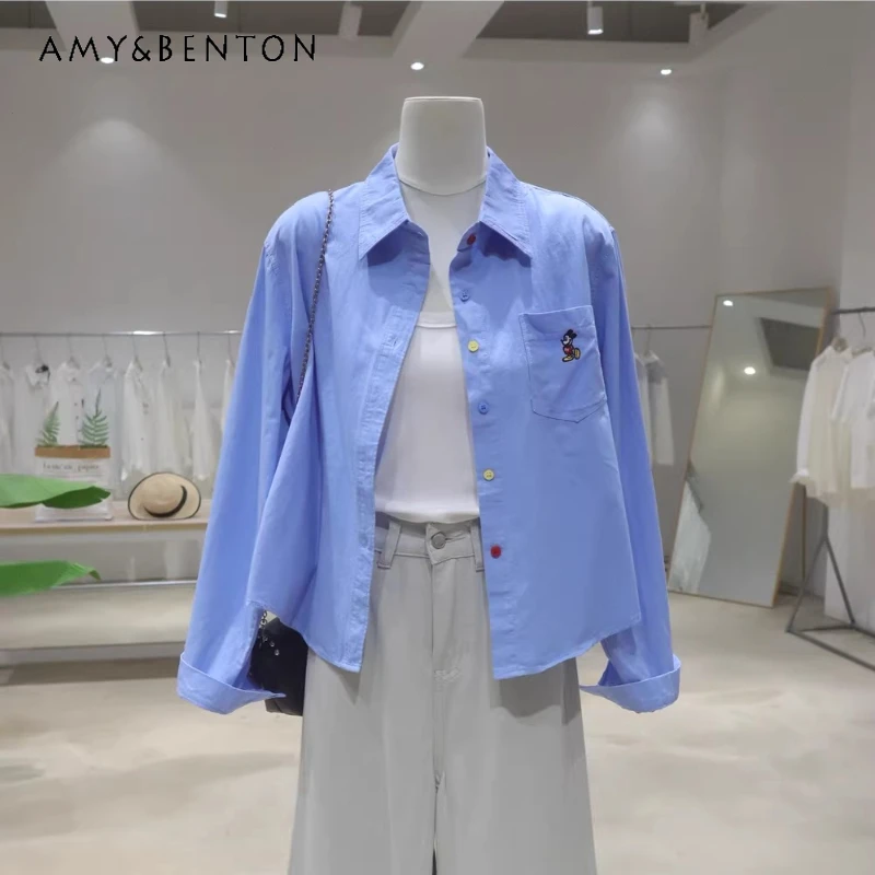 

Korean Style Pocket Cartoon Embroidery New Top Shirt 2026 Spring Versatile Loose And Thin Cotton Long-sleeved Short Blouse Women