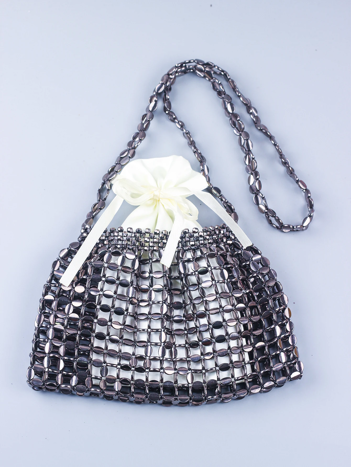 Handmade silver gold flat bead beaded woven large-sized dumplings, fashionable and trendy one shoulder portable beaded bag