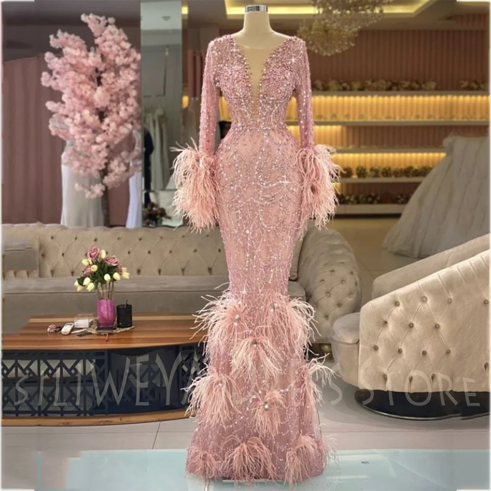 

Pink Luxury Mermaid Evening Dress Deep V-Neck Long Sleeve Rhinestone Beaded Feather Trim Formal Gown for Wedding Banquet Party